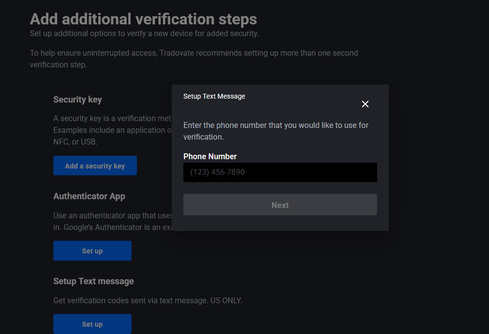 Entering a mobile phone number in the SMS text code option on Tradovate's Security page